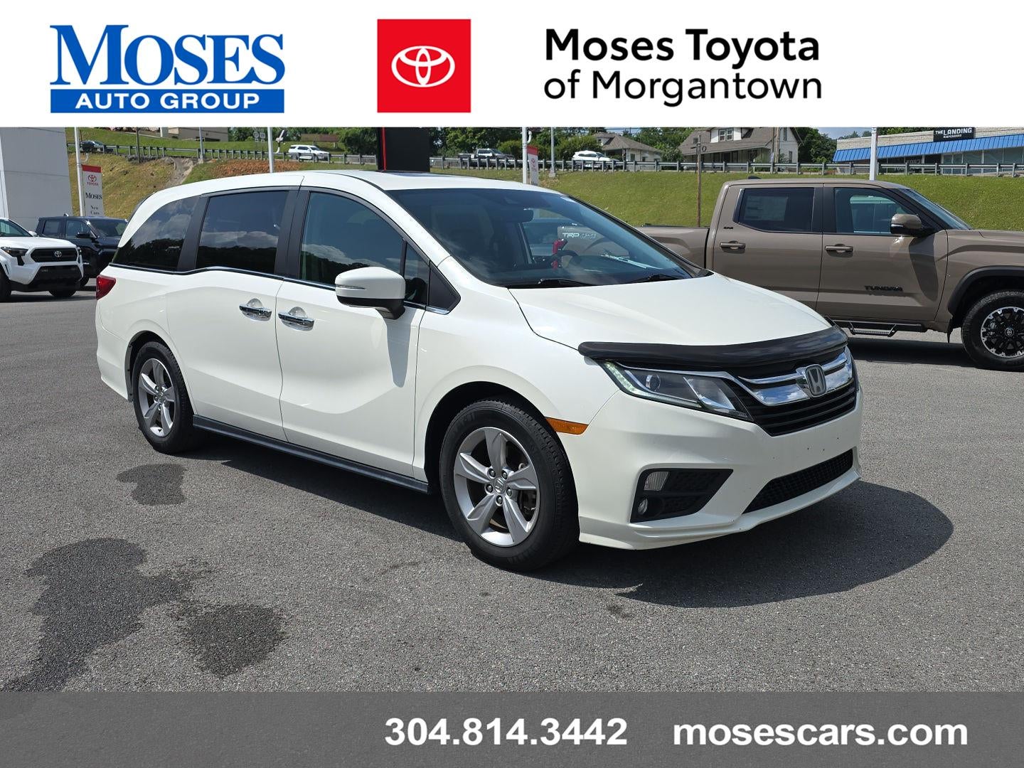 2018 Honda Odyssey EX-L in White Diamond Pearl — front three-quarter view
