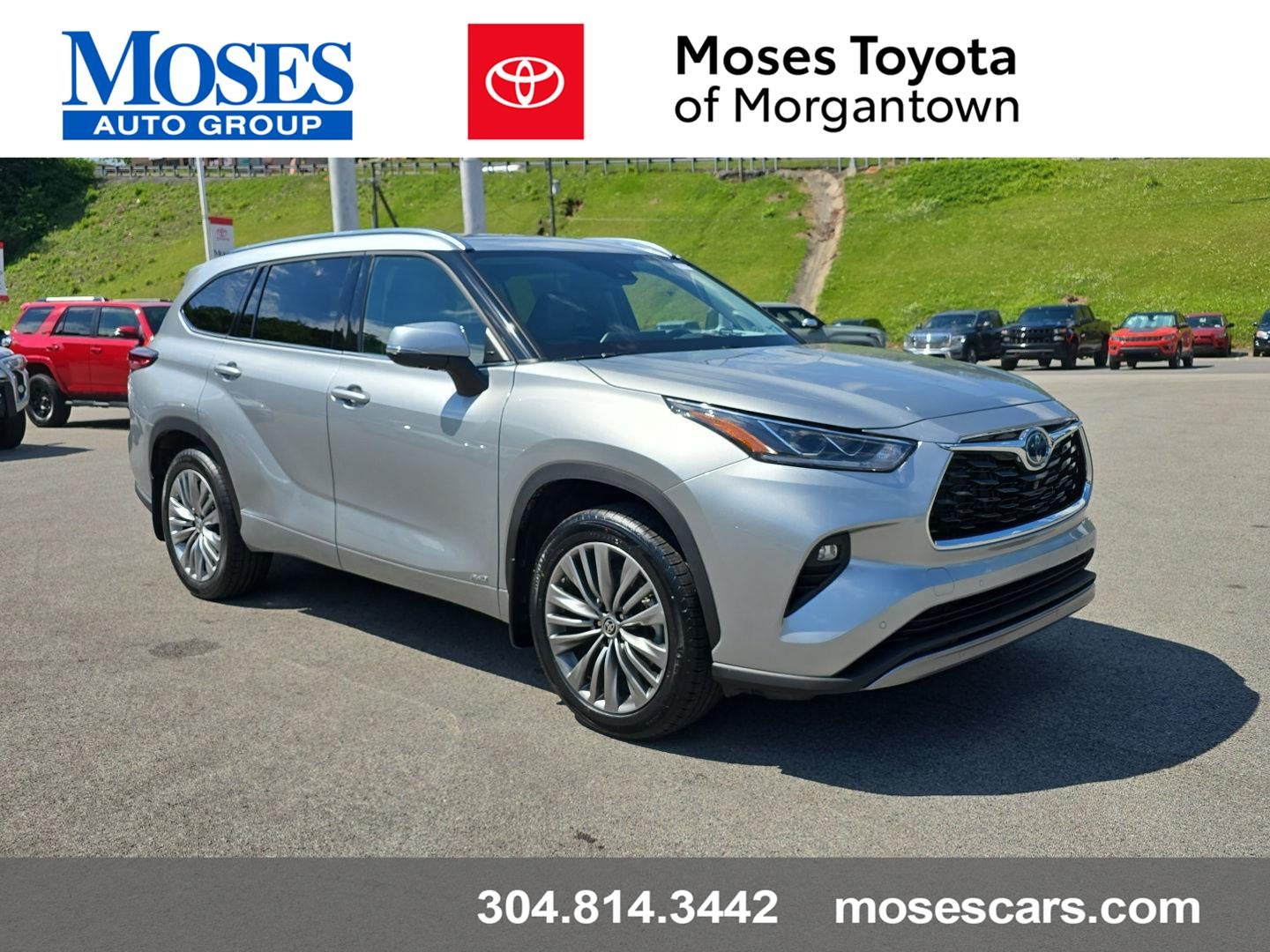 2022 Toyota Highlander Hybrid Platinum in Celestial Silver Metallic — front three-quarter view