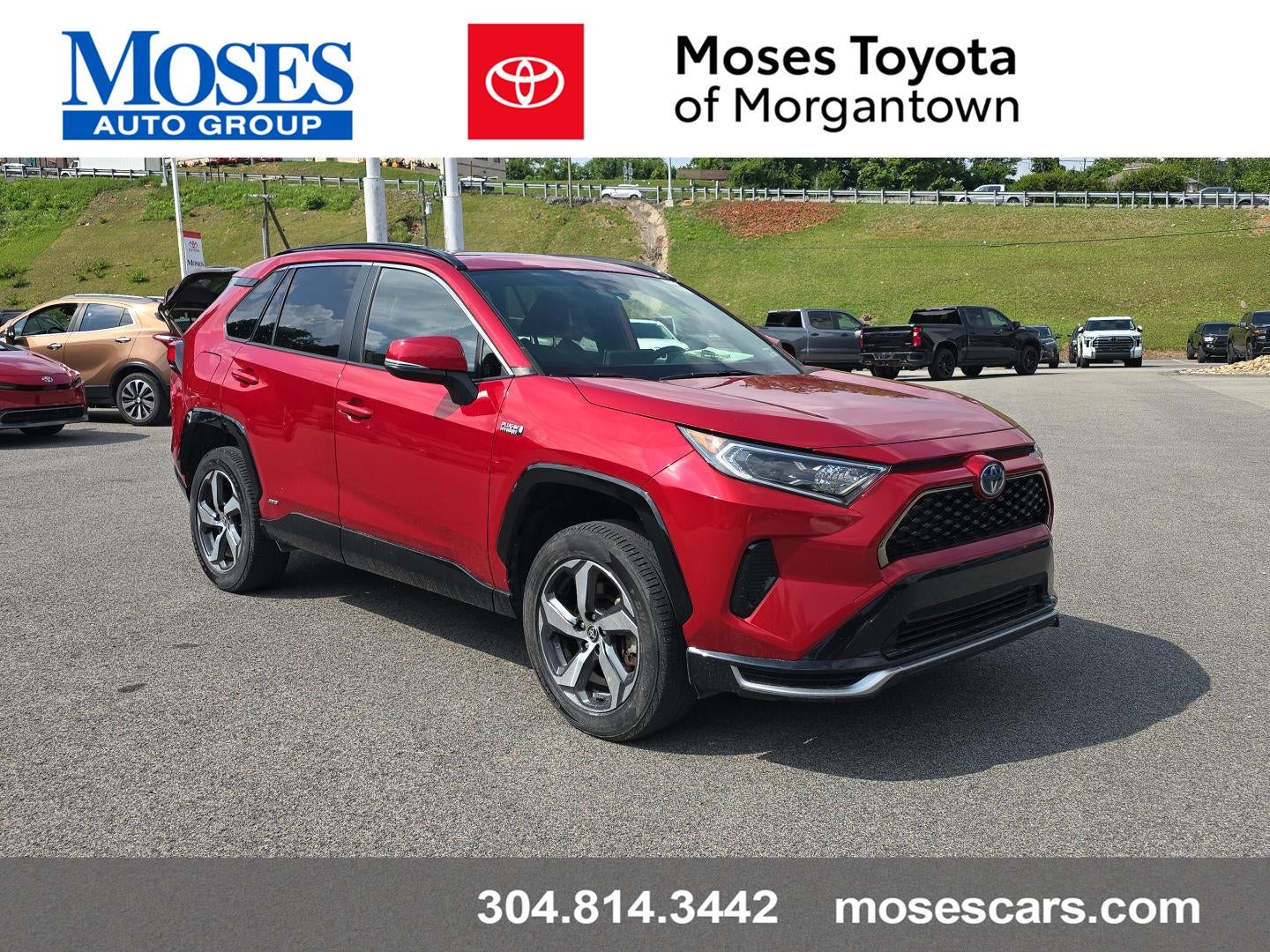 2021 Toyota RAV4 Prime SE in Supersonic Red — front three-quarter view